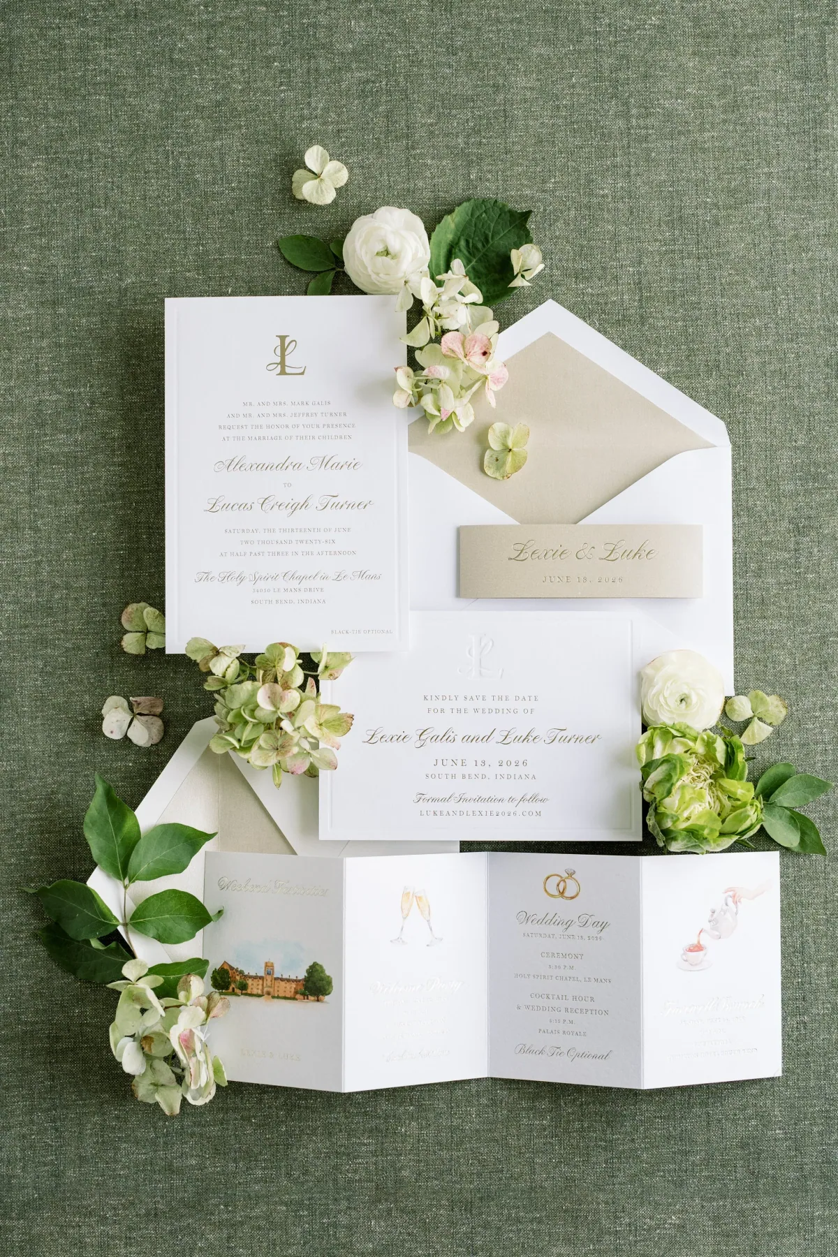 White folio invitation on moss green linen