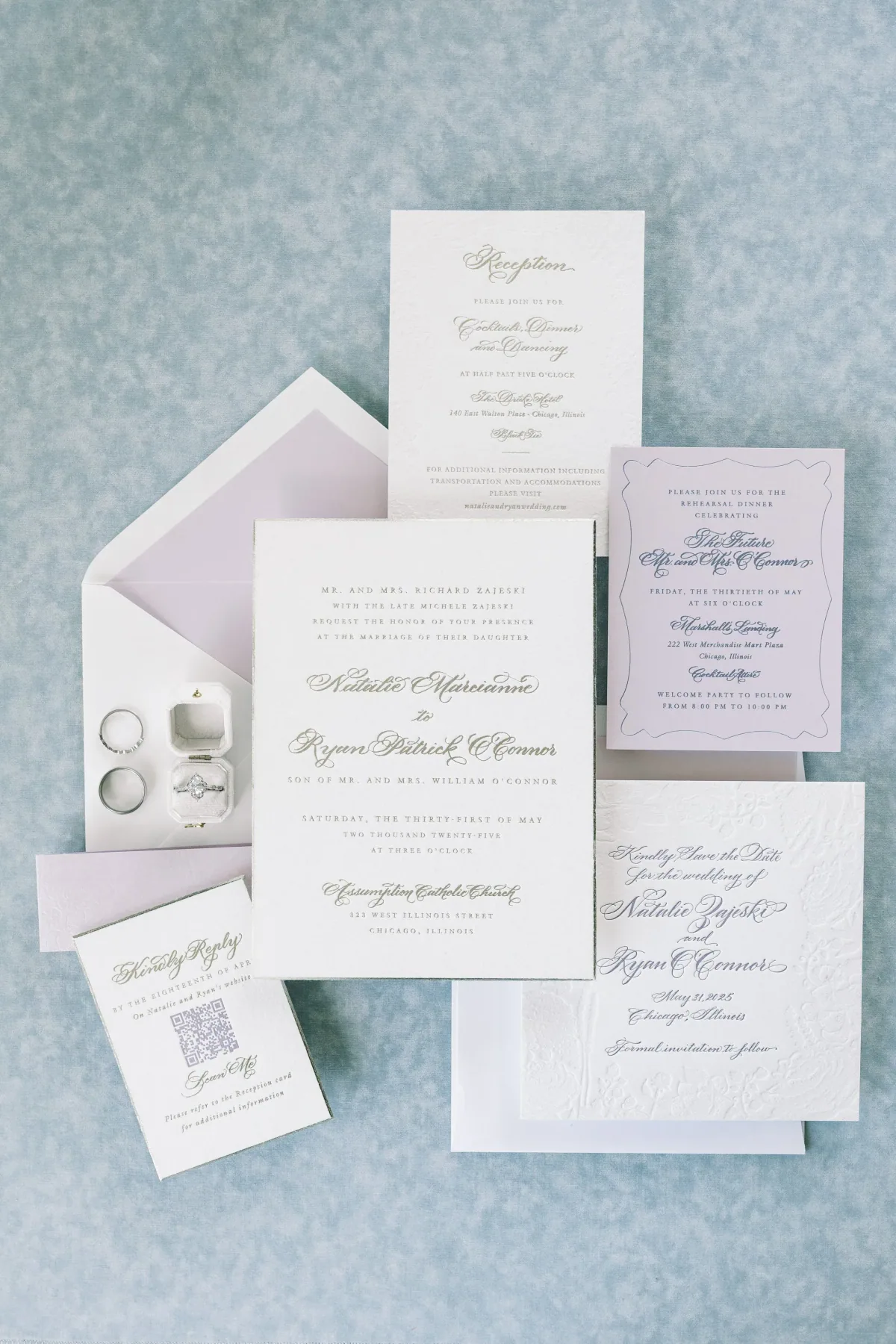 Lavender wedding invitation suite with lined envelope and rings