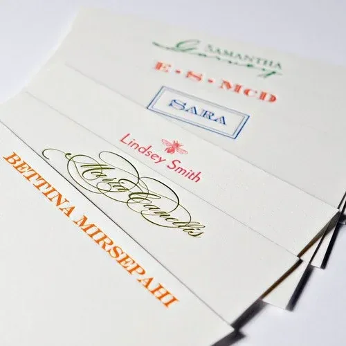 Personalized stationery samples in a range of lettering styles and ink colors