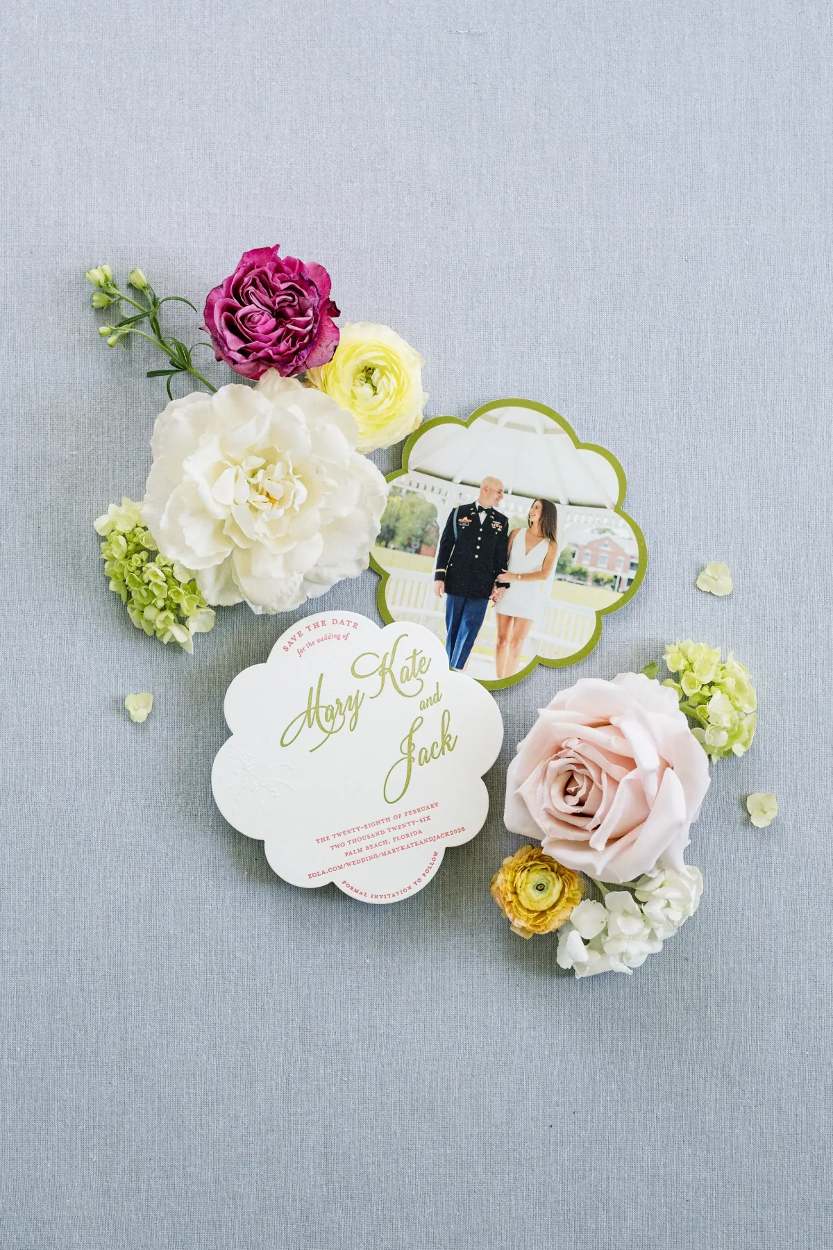 Scalloped photo save the date surrounded by blooms